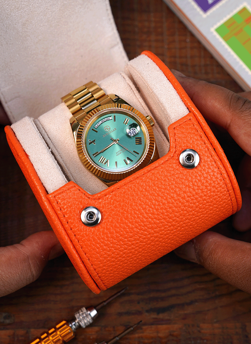 Rollo de reloj naranja – Un reloj