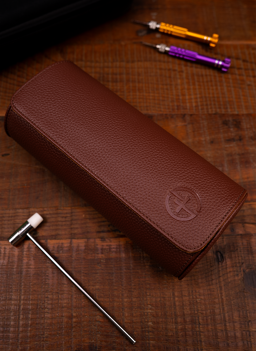 Estuche marrón para relojes: tres relojes