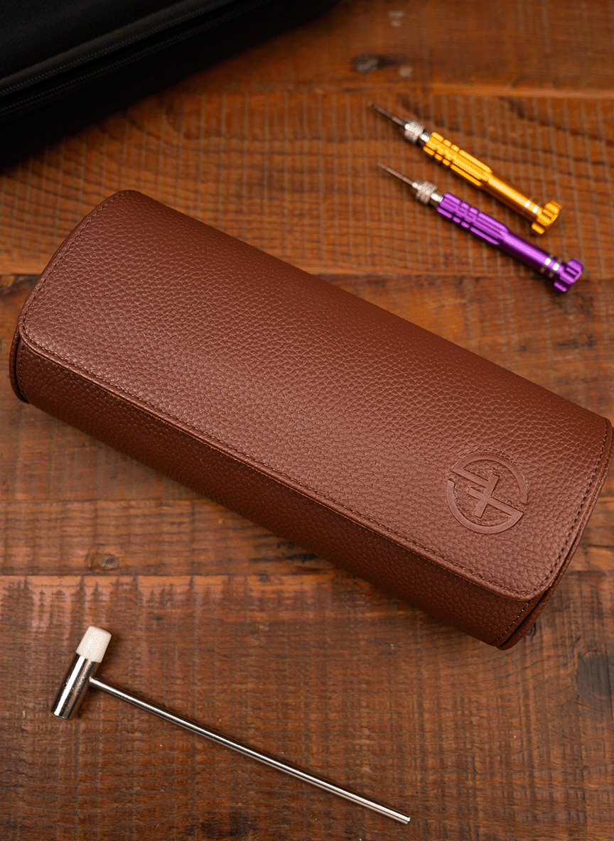 Estuche marrón para relojes: tres relojes